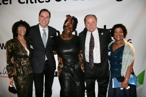 SCOLA Chairman Tom Gilmore and former L.A. City Councilman Tom LaBonge with members of the Los Angeles Lusaka Sister City Committee